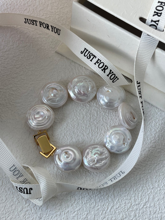 bracciale barocco rotondo e paffuto
