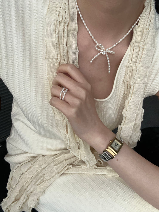 piccola collana con fiocco di perle